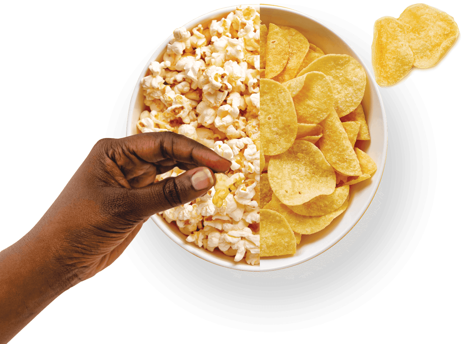 Hand choosing popcorn over chips